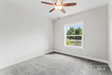 Welcome to this beautifully maintained 4 bedroom, 3 bath home on Hunters Point Golf Club in Idaho - for sale on GolfHomes.com, golf home, golf lot