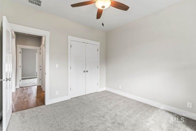 Welcome to this beautifully maintained 4 bedroom, 3 bath home on Hunters Point Golf Club in Idaho - for sale on GolfHomes.com, golf home, golf lot