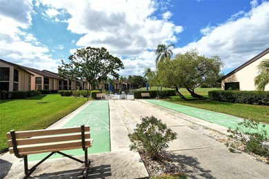 Welcome to your future oasis at 6261 Timber Lake Drive, Unit F6 on Palm Aire Country Club of Sarasota in Florida - for sale on GolfHomes.com, golf home, golf lot