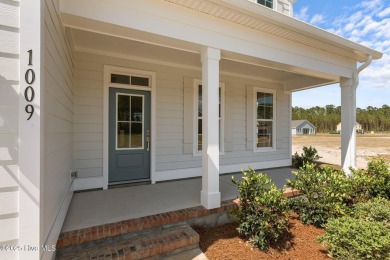 This beautifully designed New Castle II floor plan offers the on Carolina Colours Golf Club in North Carolina - for sale on GolfHomes.com, golf home, golf lot