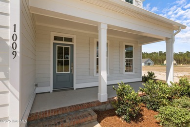 BUILDER NOW OFFERING $25,000 USE AS YOU CHOOSE - must closed by on Carolina Colours Golf Club in North Carolina - for sale on GolfHomes.com, golf home, golf lot