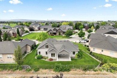 Welcome to this beautifully maintained 4 bedroom, 3 bath home on Hunters Point Golf Club in Idaho - for sale on GolfHomes.com, golf home, golf lot