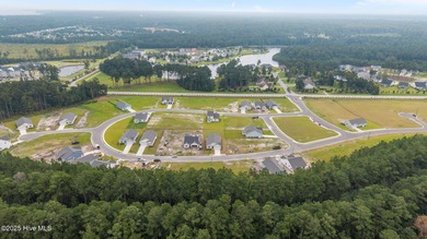 BUILDER NOW OFFERING $25,000 USE AS YOU CHOOSE - must closed by on Carolina Colours Golf Club in North Carolina - for sale on GolfHomes.com, golf home, golf lot