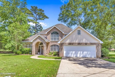 Step into this beautiful home right on the GOLF COURSE with high on Diamondhead Country Club in Mississippi - for sale on GolfHomes.com, golf home, golf lot