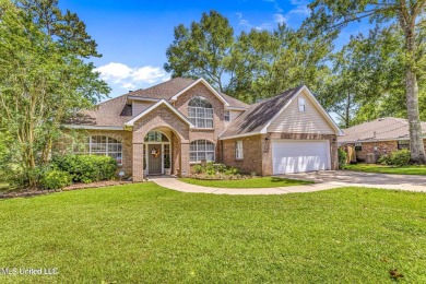 Step into this beautiful home right on the GOLF COURSE with high on Diamondhead Country Club in Mississippi - for sale on GolfHomes.com, golf home, golf lot