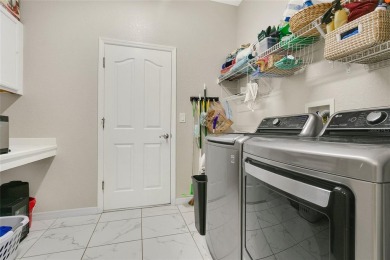 Welcome to 4002 Richmond Crossing, a beautifully maintained on Arlington Ridge Golf Club in Florida - for sale on GolfHomes.com, golf home, golf lot