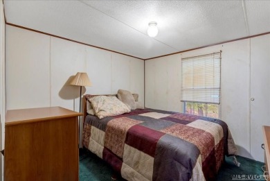 Discover comfort, convenience, and community in this 3-bedroom on River Ridge Golf Club in Virginia - for sale on GolfHomes.com, golf home, golf lot