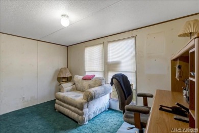 Discover comfort, convenience, and community in this 3-bedroom on River Ridge Golf Club in Virginia - for sale on GolfHomes.com, golf home, golf lot