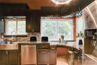 Discover your private retreat in this hidden gem, offering the on Emerald Lake Golf Club in North Carolina - for sale on GolfHomes.com, golf home, golf lot