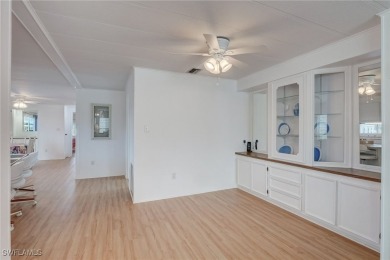 Enjoy the temperate winter weather with plenty of outdoor living on Riverbend Golf and Country Club in Florida - for sale on GolfHomes.com, golf home, golf lot