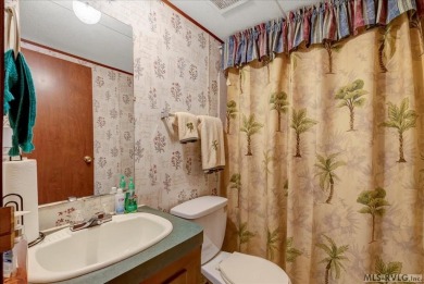 Discover comfort, convenience, and community in this 3-bedroom on River Ridge Golf Club in Virginia - for sale on GolfHomes.com, golf home, golf lot