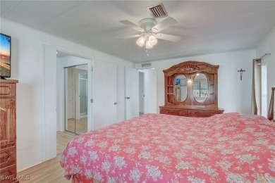 Enjoy the temperate winter weather with plenty of outdoor living on Riverbend Golf and Country Club in Florida - for sale on GolfHomes.com, golf home, golf lot