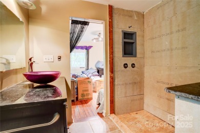 Discover your private retreat in this hidden gem, offering the on Emerald Lake Golf Club in North Carolina - for sale on GolfHomes.com, golf home, golf lot