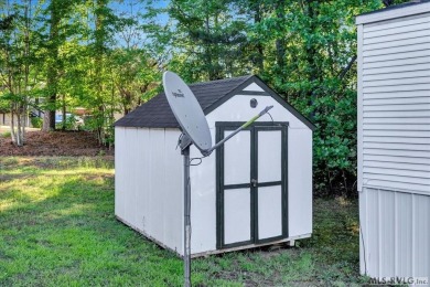 Discover comfort, convenience, and community in this 3-bedroom on River Ridge Golf Club in Virginia - for sale on GolfHomes.com, golf home, golf lot