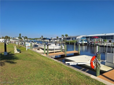 Enjoy the temperate winter weather with plenty of outdoor living on Riverbend Golf and Country Club in Florida - for sale on GolfHomes.com, golf home, golf lot