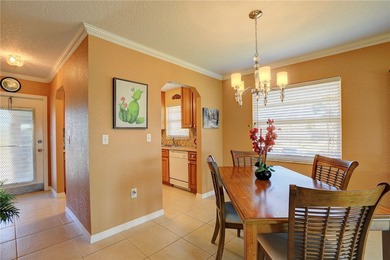Cozy Plan B 2-bed/2-bath condo with panoramic golf and lake on The American Golf Club in Florida - for sale on GolfHomes.com, golf home, golf lot