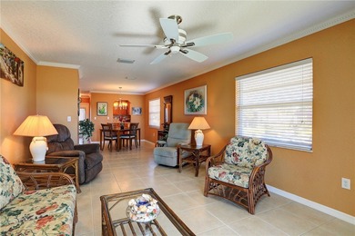 Cozy Plan B 2-bed/2-bath condo with panoramic golf and lake on The American Golf Club in Florida - for sale on GolfHomes.com, golf home, golf lot