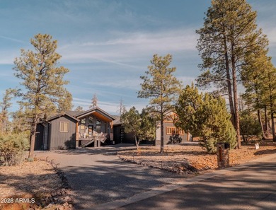 Nestled among the tall pines of the prestigious Torreon Golf on Torreon Golf Club in Arizona - for sale on GolfHomes.com, golf home, golf lot