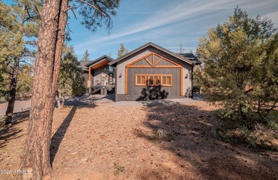 Nestled among the tall pines of the prestigious Torreon Golf on Torreon Golf Club in Arizona - for sale on GolfHomes.com, golf home, golf lot