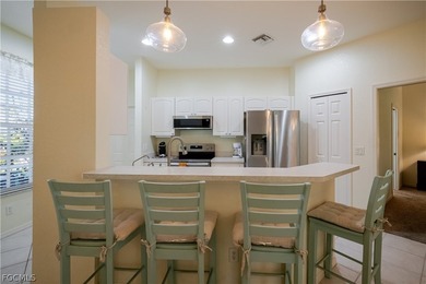 Welcome to this beautifully maintained Ibis II model home in the on Herons Glen Golf and Country Club in Florida - for sale on GolfHomes.com, golf home, golf lot