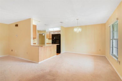 One or more photo(s) has been virtually staged. Seller may on Wedgefield Golf Club in Florida - for sale on GolfHomes.com, golf home, golf lot