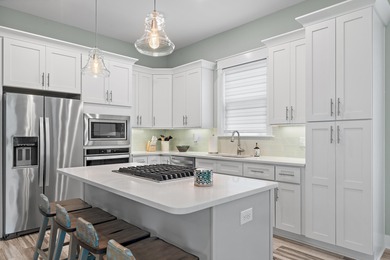 Welcome to 52 Charming Way, a beautifully maintained coastal on Santa Rosa Golf and Beach Club in Florida - for sale on GolfHomes.com, golf home, golf lot