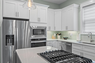 Welcome to 52 Charming Way, a beautifully maintained coastal on Santa Rosa Golf and Beach Club in Florida - for sale on GolfHomes.com, golf home, golf lot