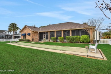 Welcome home! This charming brick homestead with a metal roof on The Club At Pelican Bay - North Course in Florida - for sale on GolfHomes.com, golf home, golf lot
