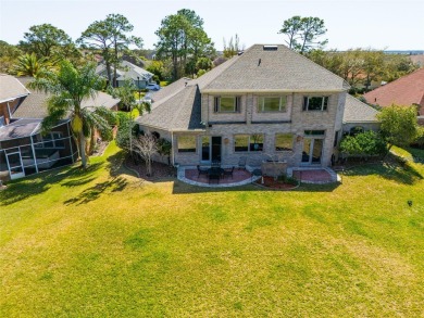 Presenting an exquisite CUSTOM-BUILT RESIDENCE exuding timeless on Marsh Valley Country Club in Florida - for sale on GolfHomes.com, golf home, golf lot