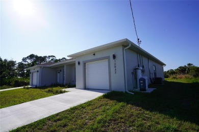 This Duplex is head to toe luxury finishes from quartz counter on Duffys Golf Center in Florida - for sale on GolfHomes.com, golf home, golf lot