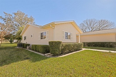 Welcome to relaxed Florida living in this inviting Dogwood model on The Links of Spruce Creek in Florida - for sale on GolfHomes.com, golf home, golf lot