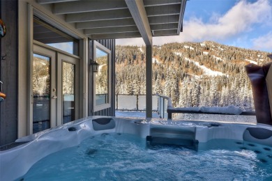 This exceptional level-entry, three-story chalet, nestled along on Sun Peaks Resort Golf Course in  - for sale on GolfHomes.com, golf home, golf lot