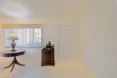 Welcome to relaxed Florida living in this inviting Dogwood model on The Links of Spruce Creek in Florida - for sale on GolfHomes.com, golf home, golf lot