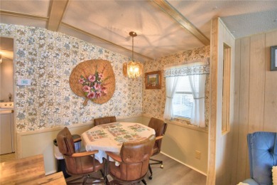 One or more photo(s) has been virtually staged. WHAT A WONDERFUL on Southern Dunes Golf and Country Club in Florida - for sale on GolfHomes.com, golf home, golf lot