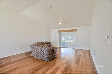 Welcome to relaxed Florida living in this inviting Dogwood model on The Links of Spruce Creek in Florida - for sale on GolfHomes.com, golf home, golf lot