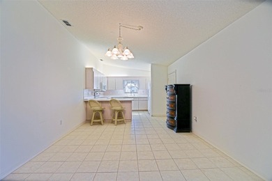 Welcome to relaxed Florida living in this inviting Dogwood model on The Links of Spruce Creek in Florida - for sale on GolfHomes.com, golf home, golf lot