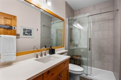 This exceptional level-entry, three-story chalet, nestled along on Sun Peaks Resort Golf Course in  - for sale on GolfHomes.com, golf home, golf lot