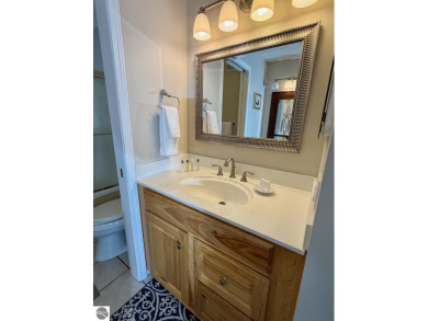 Located at Grand Traverse Resort & Spa, the Terrace Condominiums on  in Michigan - for sale on GolfHomes.com, golf home, golf lot