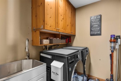 This exceptional level-entry, three-story chalet, nestled along on Sun Peaks Resort Golf Course in  - for sale on GolfHomes.com, golf home, golf lot