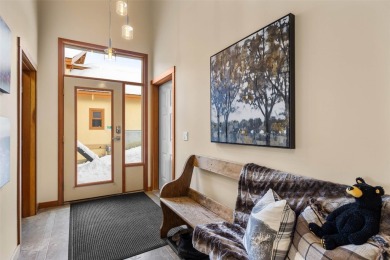 This exceptional level-entry, three-story chalet, nestled along on Sun Peaks Resort Golf Course in  - for sale on GolfHomes.com, golf home, golf lot
