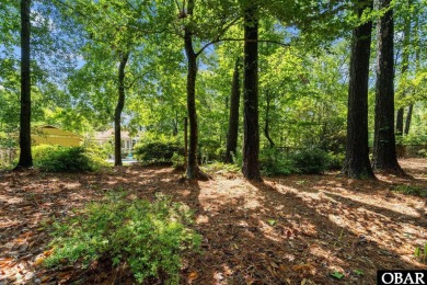 Welcome Home! Come see this beautiful house that sits on a 29 on Duck Woods Country Club in North Carolina - for sale on GolfHomes.com, golf home, golf lot