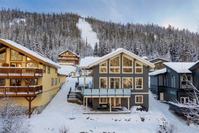 This exceptional level-entry, three-story chalet, nestled along on Sun Peaks Resort Golf Course in  - for sale on GolfHomes.com, golf home, golf lot