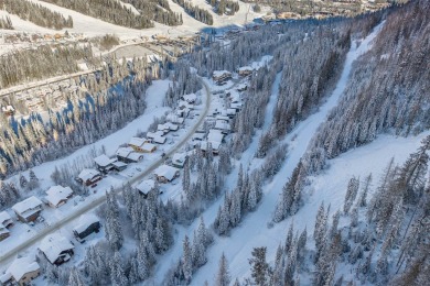 This exceptional level-entry, three-story chalet, nestled along on Sun Peaks Resort Golf Course in  - for sale on GolfHomes.com, golf home, golf lot