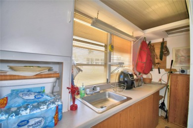 One or more photo(s) has been virtually staged. WHAT A WONDERFUL on Southern Dunes Golf and Country Club in Florida - for sale on GolfHomes.com, golf home, golf lot