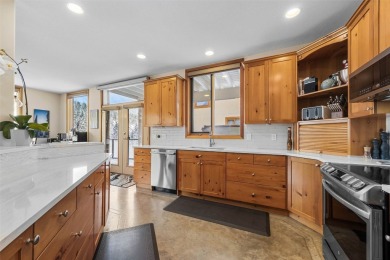 This exceptional level-entry, three-story chalet, nestled along on Sun Peaks Resort Golf Course in  - for sale on GolfHomes.com, golf home, golf lot