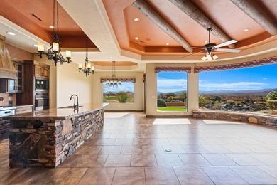 This home has stunning views of Kachina Cliffs, the Entrada Golf on Entrada at Snow Canyon in Utah - for sale on GolfHomes.com, golf home, golf lot