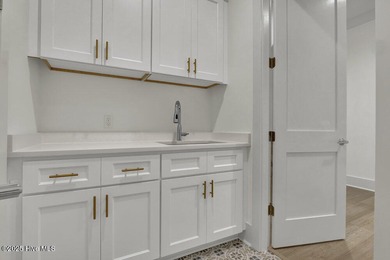 Welcome to 324 Grayhawk Circle, nestled in the exclusive gated on Porters Neck Country Club in North Carolina - for sale on GolfHomes.com, golf home, golf lot