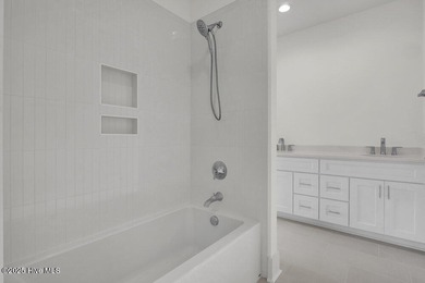 Welcome to 324 Grayhawk Circle, nestled in the exclusive gated on Porters Neck Country Club in North Carolina - for sale on GolfHomes.com, golf home, golf lot