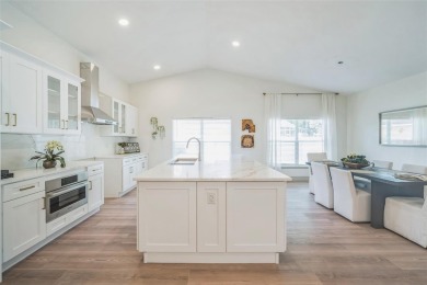 Looking for the WOW factor? NEWLY RENOVATED **GUARD GATED NINE on The Eagles Golf Course and Club in Florida - for sale on GolfHomes.com, golf home, golf lot