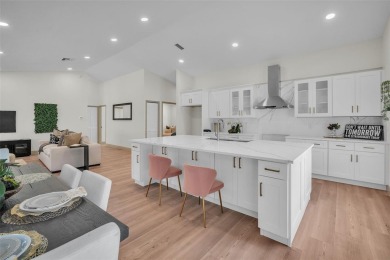 Looking for the WOW factor? NEWLY RENOVATED **GUARD GATED NINE on The Eagles Golf Course and Club in Florida - for sale on GolfHomes.com, golf home, golf lot